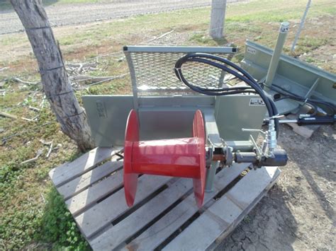 hydraulic wire roller for skid steer|hydraulic skid steer.